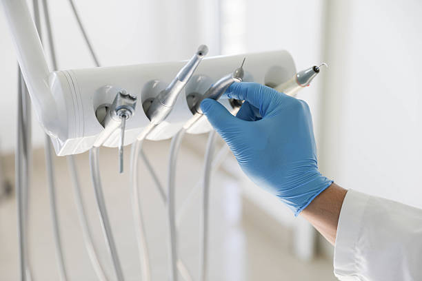Professional Tooth Extraction technician working in Wells County County, IN